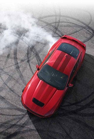 Overhead view of a 2024 Ford Mustang® model with tire tracks on pavement | Donley Ford of Galion, Inc. in Galion OH